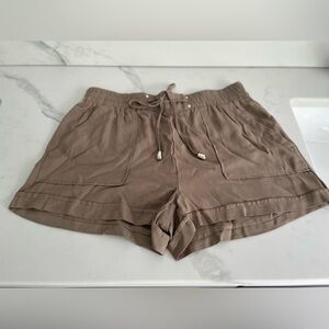 New without tags, branding tags cut out to prevent in store return”, size Large